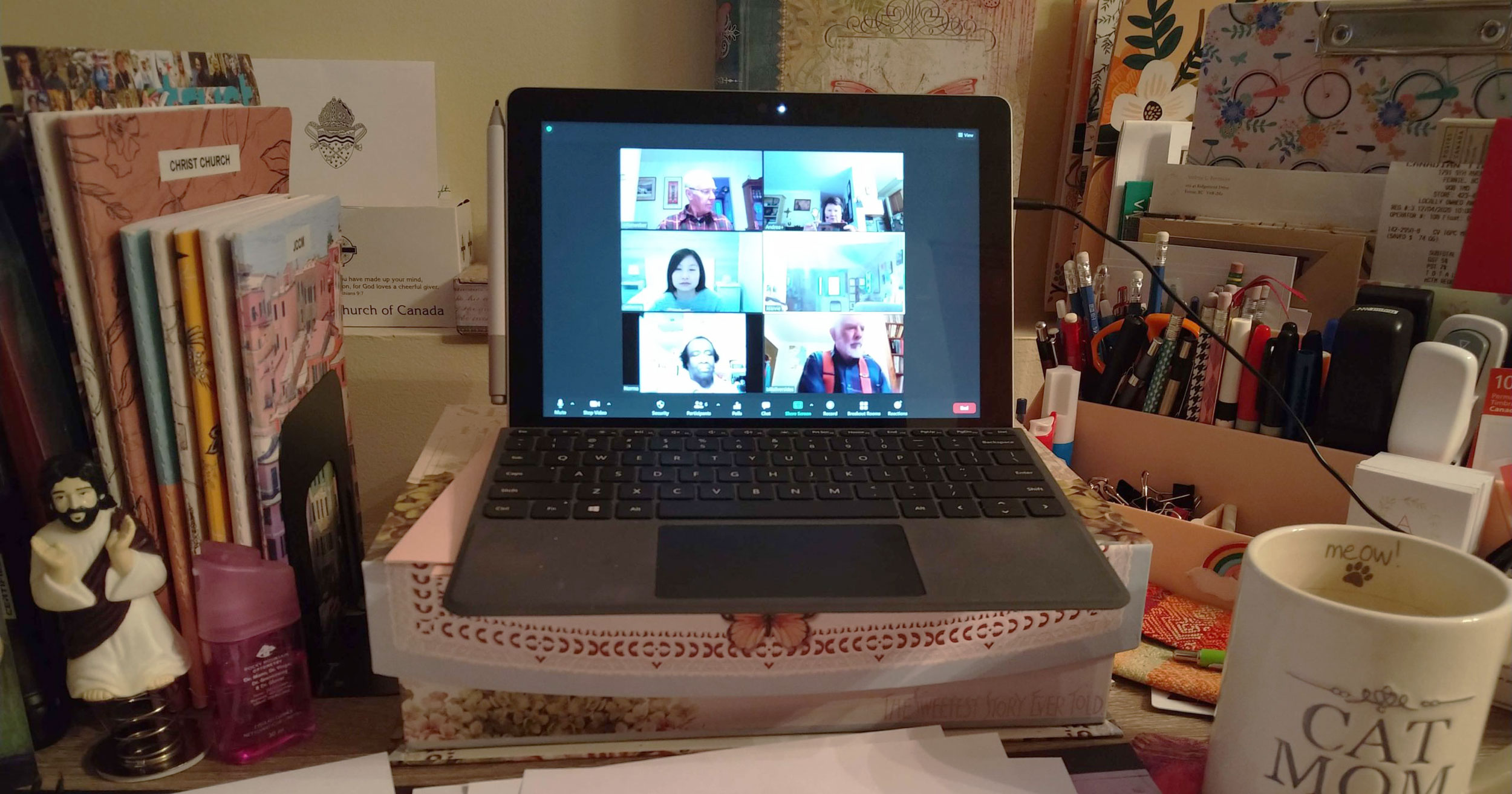 The Rev. Andrea Brennan’s desk during Zoom meeting.