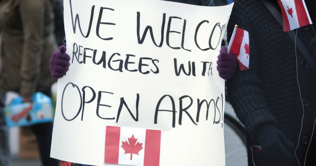 We Welcome Refugees to Canada with Open Arms: Photograph by Arindam Banerjee — Shutterstock